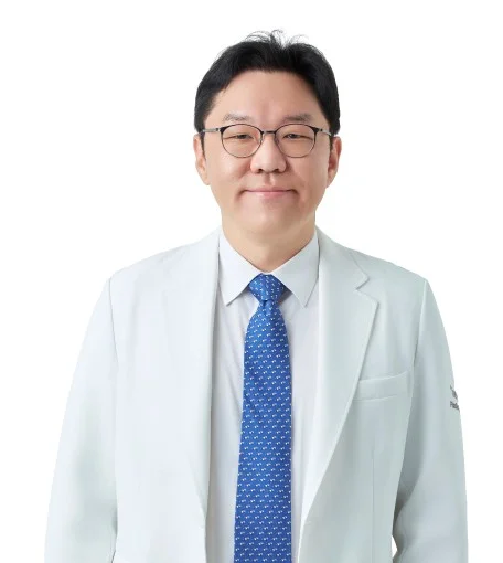 Portrait of Dr. Taek Kyun Kim, Director, THE PLUS Plastic Surgery at The Plus Plastic Surgery